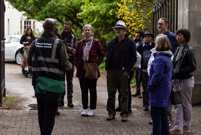 Group of adults attending  Soho Settlers launch event