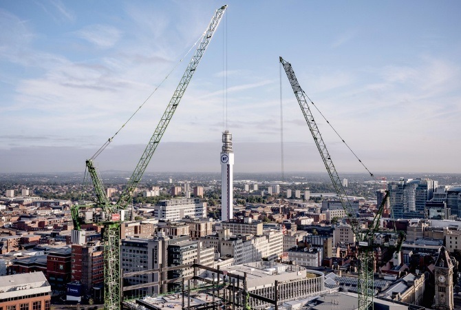 Skyling across central Birmingham with cranes to represent building work