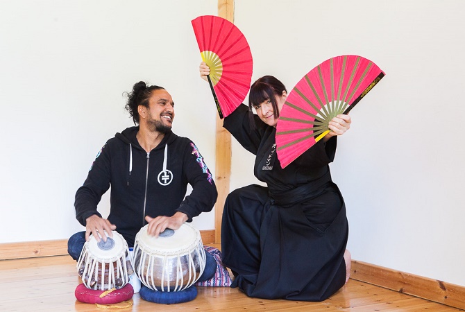 Left to right. Tabla player Mendi Singh and martial artist Fay Goodman