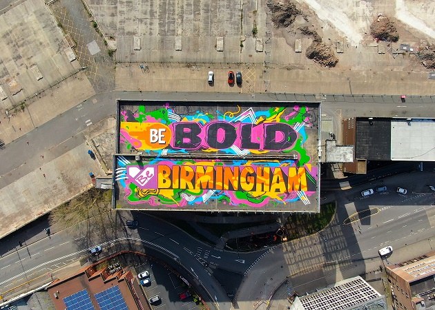 Colourful mural on carpark roof promoting Be Bold, Be Birmingham campaign