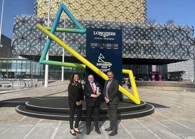 Deborah Cadman, US Ambassador Philip T. Reeker and Craig Cooper outside the Birmingham 2022 countdown clock in Centenary Square, Birmingham
