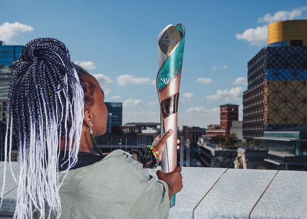 Artist and baton designer, Laura Nyahuye, holds the Birmingham 2022 Commonwealth Games Queen’s Baton as it is unveiled to the world for the first time