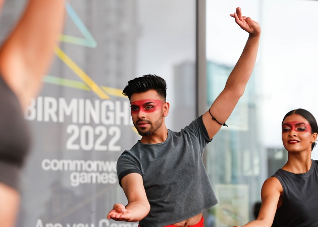 A group of dancers performing ahead of the Birmingham 2022 Festival